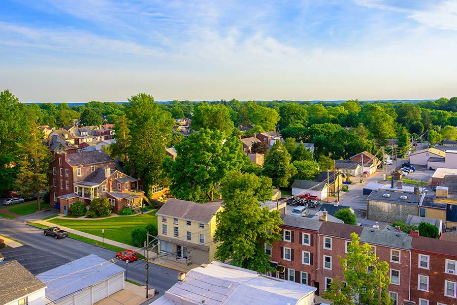 Springfield PA - View of Main Street in a Small Town in Pennsylvania Surrounded by Green Trees